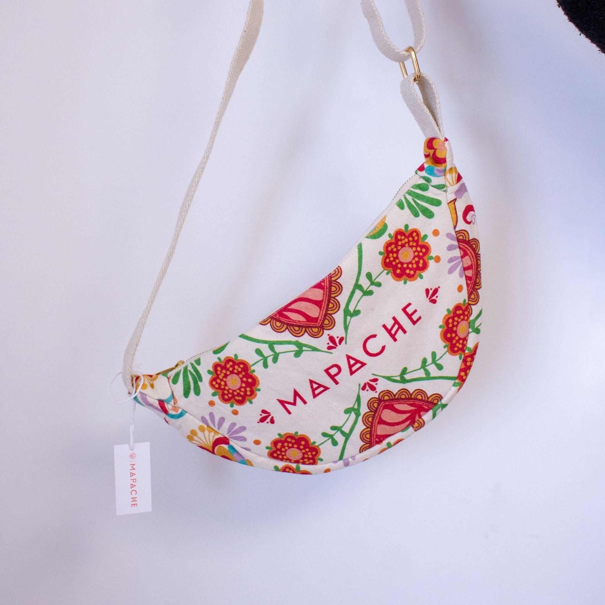 Banane Las Preciosas - vue suspendue face avant avec fleurs stylisées.